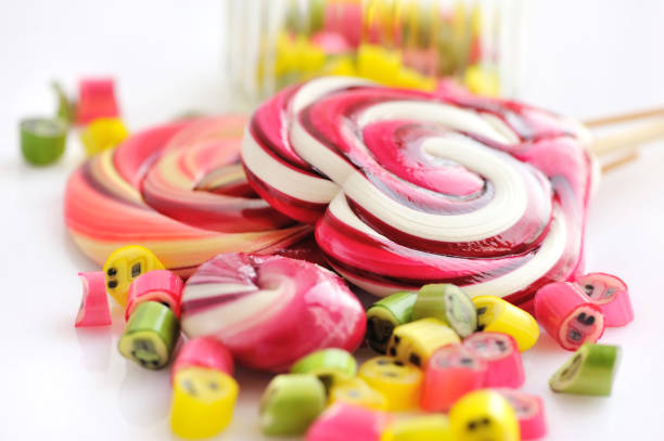 istock Colorful candies and lollipops on a white background 1252617308