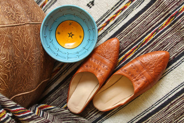 souvenirs from morocco. babouches - soft moroccan shoes, slippers without a backdrop - morocco marrakech moroccan culture casablanca imagens e fotografias de stock