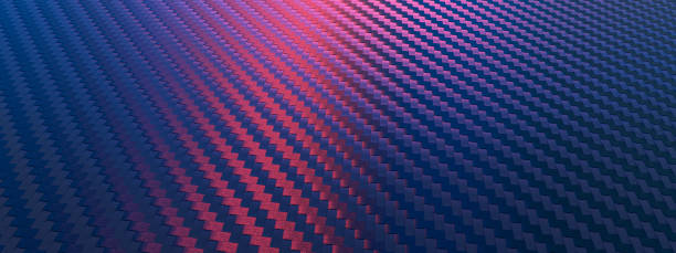 Carbon fiber composite raw material Carbon fiber composite raw material background with blue and red reflections carbon fibre photos stock pictures, royalty-free photos & images
