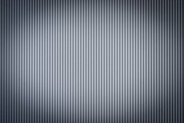 istock Gray corrugated Metal Sheet Wall Background with nice spotlight vignette 1252625352