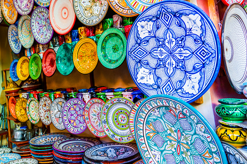 Moroccan colourful porcelain and ceramic plates. Medina of Marrakech.
