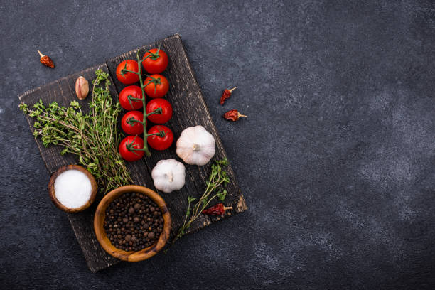 istock Tomatoes, thyme, garlic and spices 1252625642