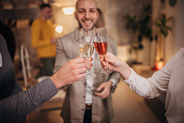istock Young business people at corporate party 1252630441