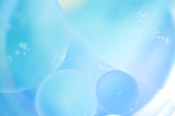 istock bubble oil drops on the water surface, abstract background 1252631760