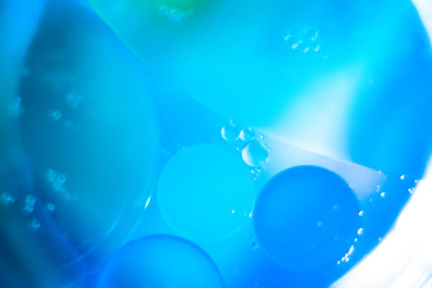 istock bubble oil drops on the water surface, abstract background 1252631774