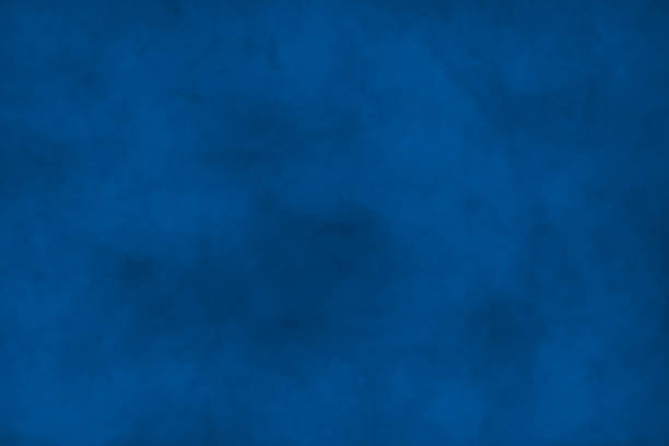 istock Dark painted surface in navy blue tones. Variety paint spots on wall. Mixed media backdrop 1252650249