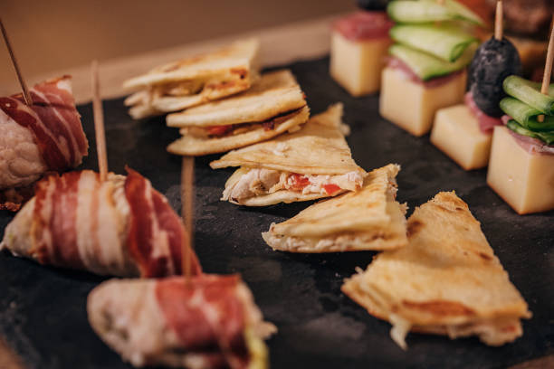 istock Beautifully arranged canapes appetizers on table 1252655741