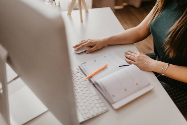 istock Young woman works from home 1252656371
