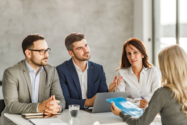 istock Human resource team talking to a candidate on a job interview. 1252661400