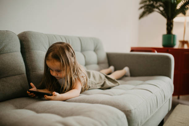 istock twins play and draw at home 1252662093