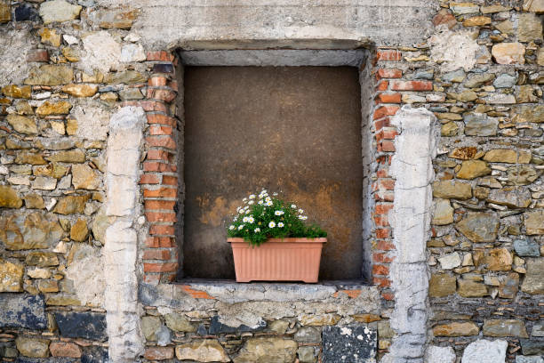 Weathered stone and brick wall background.