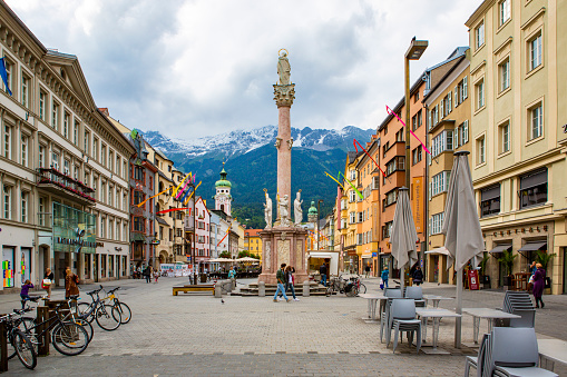 INNSBRUCK, AUSTRIA - JUNE 26, 2013: Street in historical part of Innsbruck in a summer day