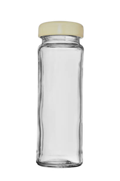 istock Empty narrow glass bottle with a lid. Isolated on a white background 1252670079