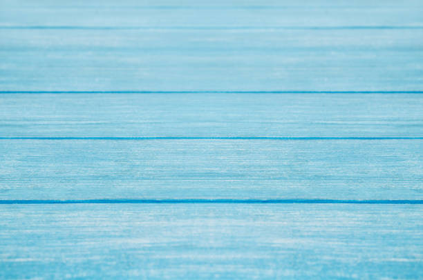 Blue painted pastel wood planks background with visible wooden texture. High quality photo with copy space over wood pattern for flat lay concepts