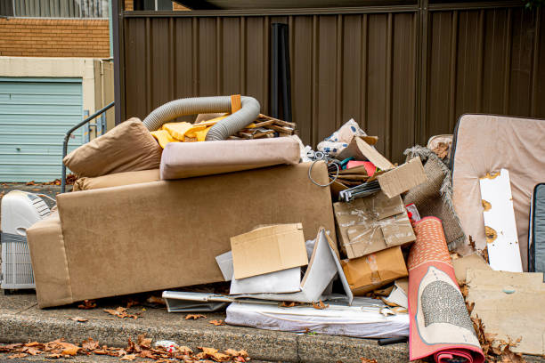 istock Household miscellaneous rubbish items put on curbside for council waste collection. 1252673421