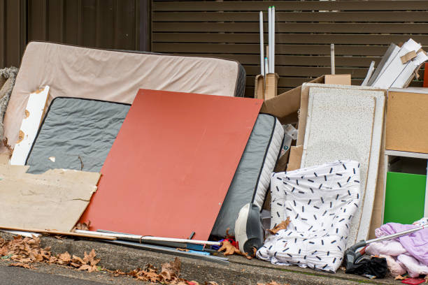 istock Household miscellaneous rubbish items put on curbside for council waste collection. 1252673997