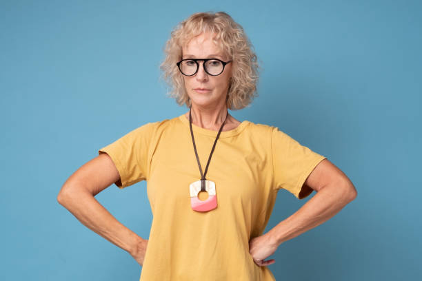 istock Serious confident woman in glasses with serious expression. 1252677029