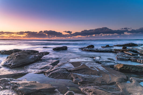 istock Dawn Seascape with a low cloud bank 1252677268