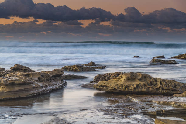 istock Sunrise Seascape with a low cloud bank 1252677422