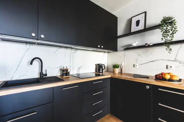 Photo of Kitchen in a modern studio apartment for rent. Interior design.