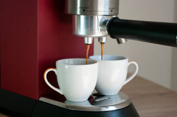 istock Red coffee machine and two cups, mockup, espresso make. 1252680766