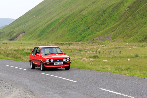 Moffat, Scotland - June 29, 2019: 1982 Ford Fiesta Sport car in a classic car rally en route towards the town of Moffat, Dumfries and Galloway