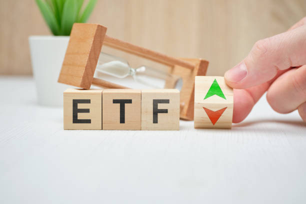 Concept business etf concept on wooden cubes. Concept business etf concept on wooden cubes. Close up. exchange traded fund stock pictures, royalty-free photos & images