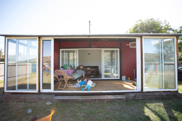 istock Family on vacation in their container house 1252686012
