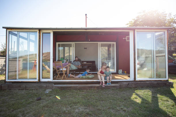 istock Family on vacation in their container house 1252686016