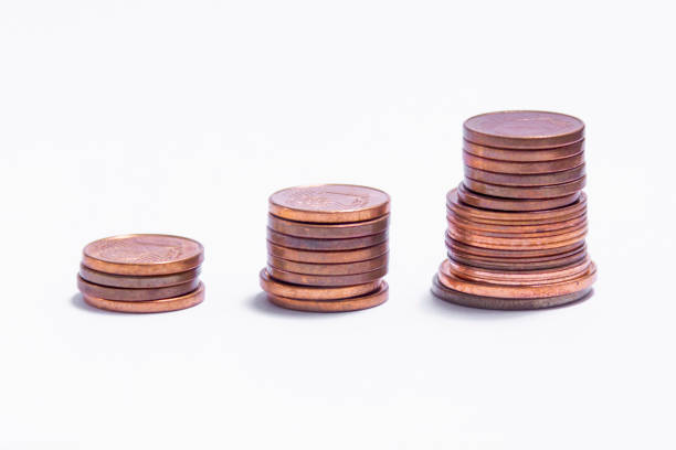 istock copper coins stockpiled in 3 columns 1252686045