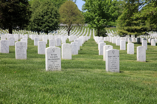 Arlington, VA, USA - May 02, 2019: Rows of Tombstones at Arlington National Cemetery. Virginia. USA