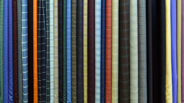 istock Vertical rolls of colorful fabric 1252689721