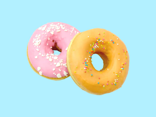 istock Tasty doughnuts with topping isolated on white background. 1252690862