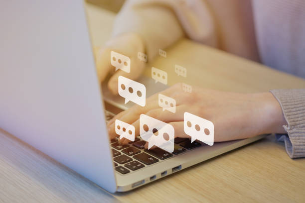 istock Girl messaging through laptop and internet. 1252690986