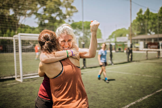istock Female soccer team winning the match 1252691120