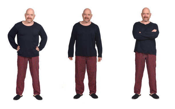Portrait of a man on white view of the same man in pajama background, same person multiple images stock pictures, royalty-free photos & images