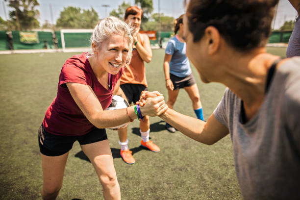 istock Female soccer team winning the match 1252691757