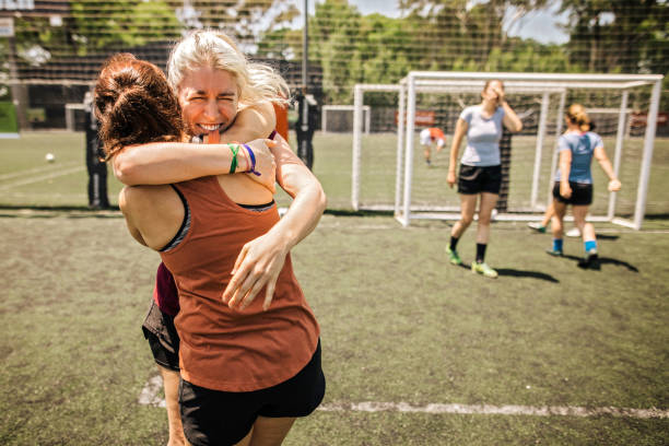 istock Female soccer team winning the match 1252691966