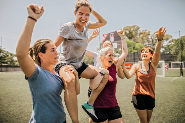 istock Female soccer team winning the match 1252692048