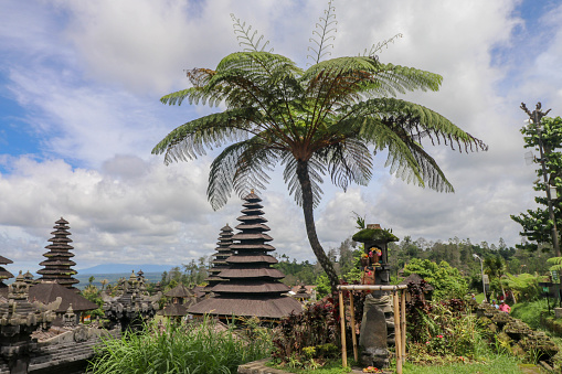 Colorful Balinese landscape with a temple. Temples in Pura Penataran Agung Besakih complex, the mother temple of Bali, Indonesia. Several balinese temples. Travel and ancient architecture background.