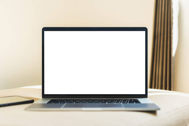 istock Mock up Blank screen laptop on the sofa for advertising and text. 1252700713