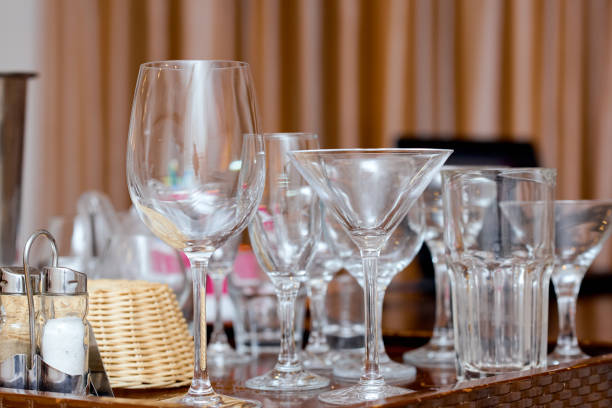 istock Set of empty glasses of different sizes on table indoors 1252701736