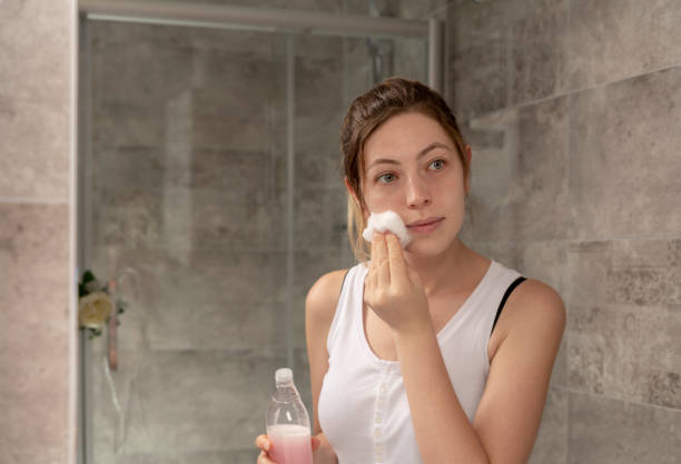 Removing Makeup Moisturizer, Peeling Off, Removing Make-Up, Facial Cleanser, Washing Face tonic water stock pictures, royalty-free photos & images