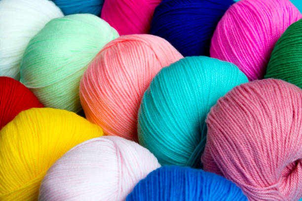 istock Bright multi-colored acrylic yarn. Colorful background. 1252704419
