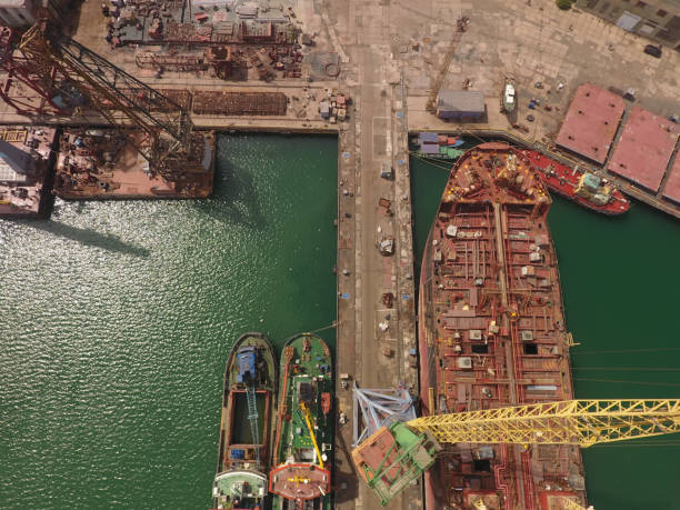 istock repair vessels hull  (ship, tanker) in shipyard 1252704688