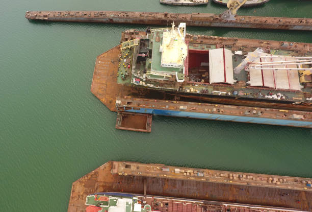 istock repair vessels hull  (ship, tanker) in shipyard 1252704700