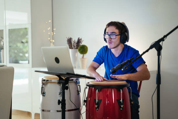 istock Video call young man playing latin congas 1252707467
