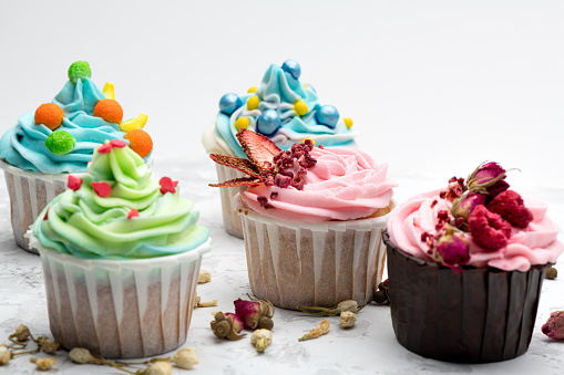 Colourful cupcakes with different decoration