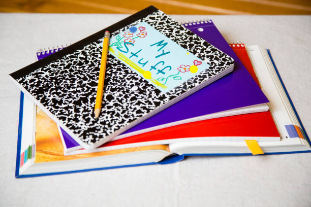 istock Back to school stack of book and spiral notebooks. 1252716026