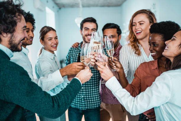 creative team toasting to their success. - party business toast champagne imagens e fotografias de stock